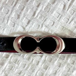 Coach belt with silver logo buckle